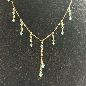 Handmade blue stone necklace.    J